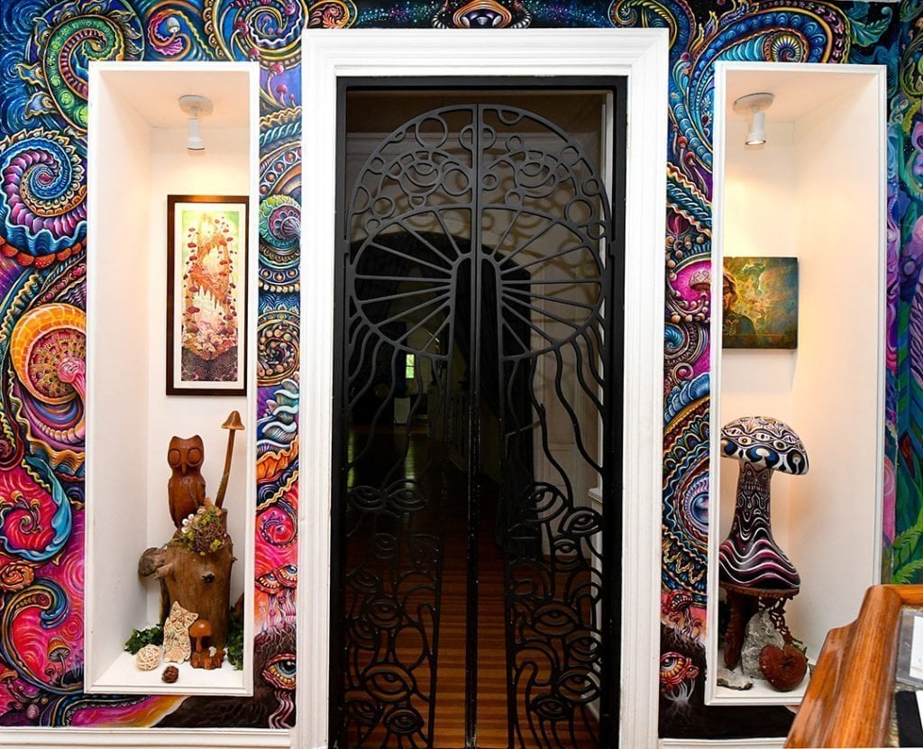 Randal Roberts and Morgan Mandala collaborated in a seamless explosion of wall-to-wall nighttime florals & paisleys around the doors Alex Grey designed.